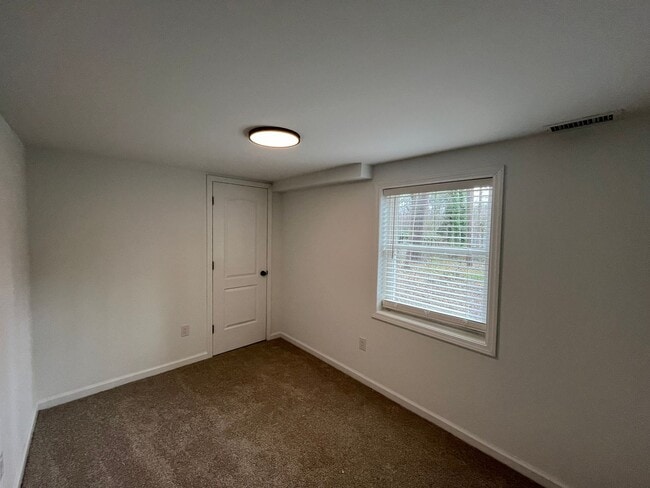 Building Photo - Modern 2BD, 2BA with 3rd Bonus Room Near Downtown Durham with Assigned Off-Street Parking and Bac...