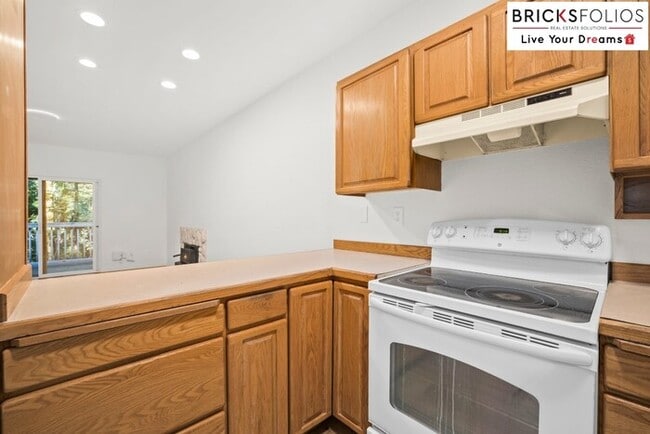 Building Photo - Live Steps from Microsoft | Stylish 2BR Condo with Fireplace & Parking