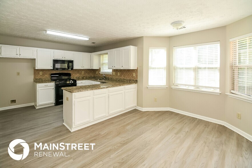Building Photo - 8535 Glenwoods Dr