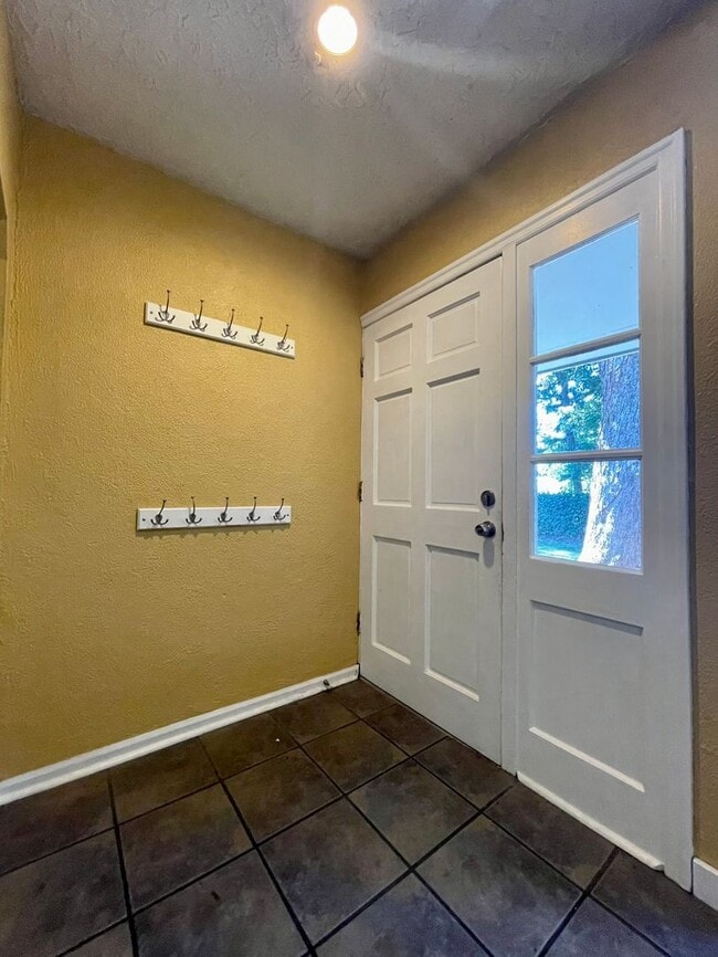 Building Photo - Updated Ranch with Large Fenced Yard, Tucked Off Walker Road~ Gas Fireplace~ Great Natural Light~...