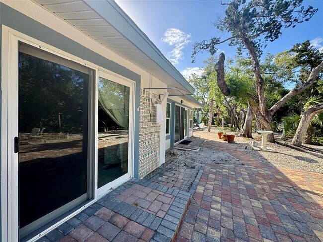 Building Photo - 7372 Melaleuca Way