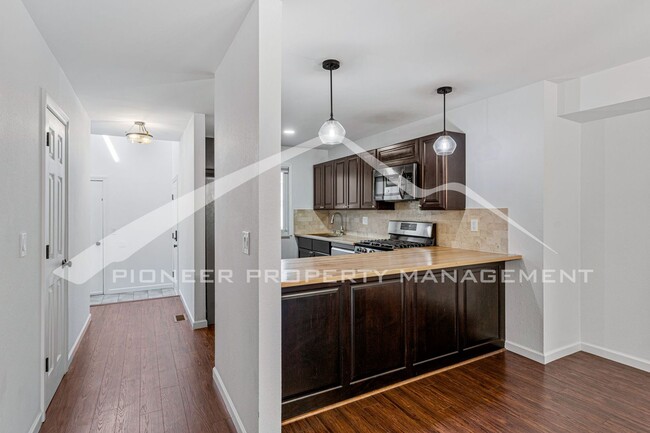 Building Photo - Spacious Condo with Patio and Central AC