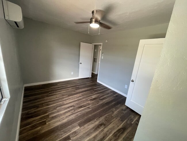 Building Photo - OPEN HOUSE! Remodeled Two Bedroom, End Unit with A/C and Large Fenced Yard