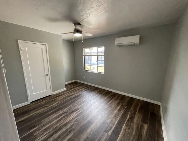 Building Photo - OPEN HOUSE! Remodeled Two Bedroom, End Unit with A/C and Large Fenced Yard