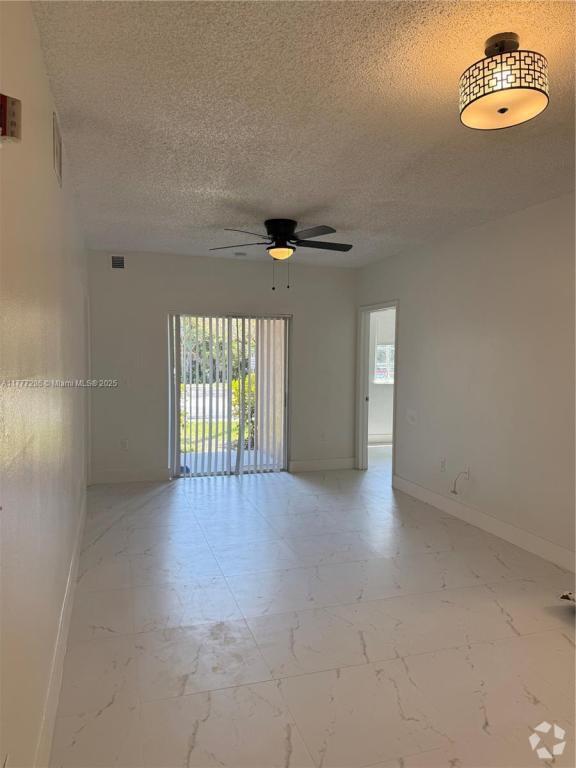Building Photo - 3221 Sabal Palm Manor