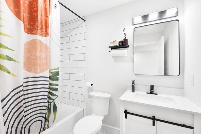 Building Photo - Movie in special, first 1/2 month rent is FREE! Charming 2-Bedroom Condo with 2 Full & 2 Half Bat...