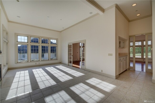 Building Photo - 8479 NE Woodland Cove Dr