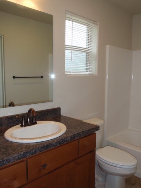 Building Photo - Newer house with attached garage. Half mon...