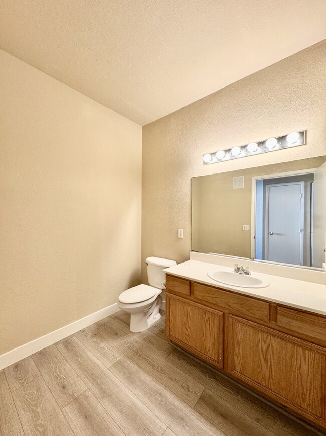 Building Photo - DOWNSTAIRS CONDO | GATED COMMUNITY | CENTENNIAL HILLS | UPDATED 3 BEDROOM