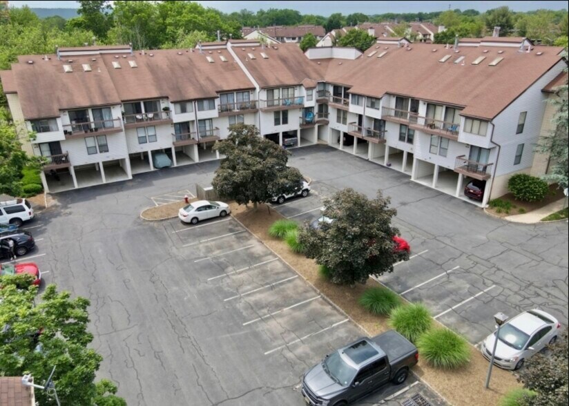 Stunning aerial view showcasing the buildings prime location and well-maintained exterior. - 3320 Richmond Ct