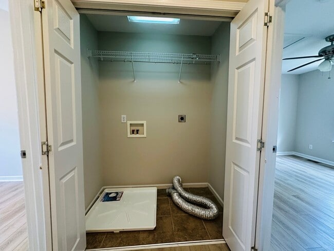 Building Photo - 2 bed, 2.5 bath updated townhouse w/ 1-car garage & Trex deck available now