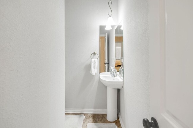 Building Photo - AUGUST PRE-LEASE Spacious 3 Bedroom 2.5 Bathroom Townhome with Covered Parking