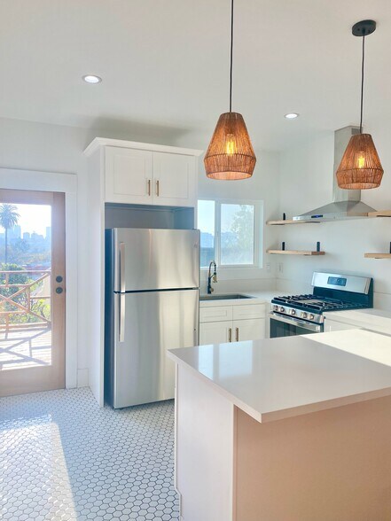 Kitchen with new fridge and stove. - 1334 Pennsylvania Ave