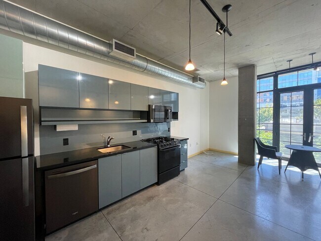 Building Photo - Industrial Highrise Available in the Stree...