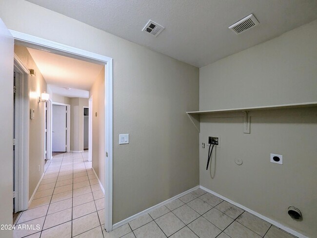 Building Photo - 7059 W Gardenia Ave