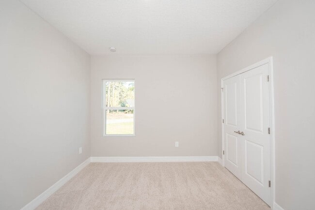 Building Photo - Peaceful and Private setting new construct...