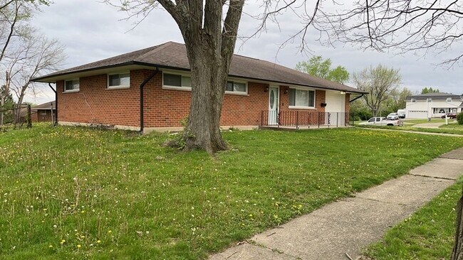 Building Photo - 5983 Harshmanville Rd