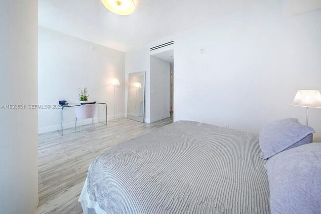 Building Photo - 10203 Collins Ave