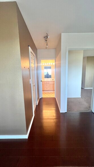 Master Bedroom (view into master bath) - 15340 Macadam Rd S