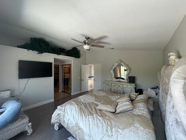 Building Photo - Upgraded 4-Bedroom Home in Gated Green Riv...