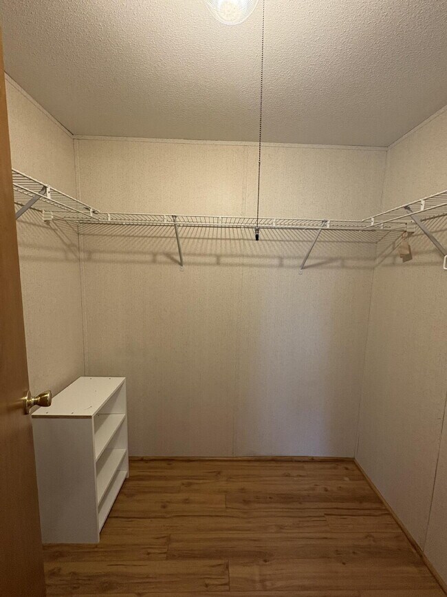 Building Photo - charming 3-bed, 2-bath home is located in the highly desired Strawberry Crest 55+ community