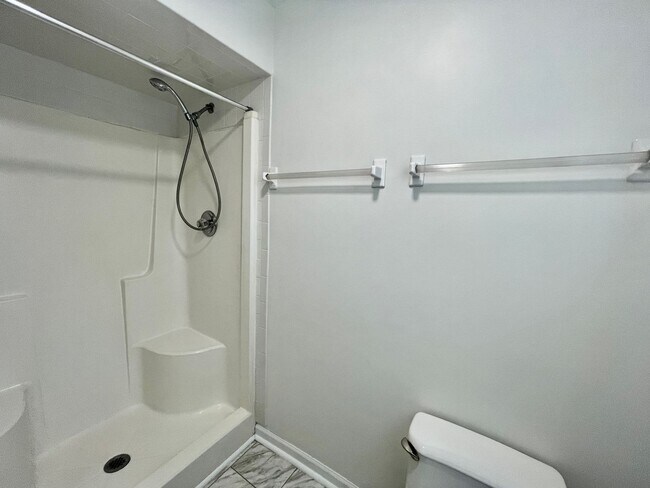 Building Photo - Available NOW! A 4-6 Bedroom Home! Attache...