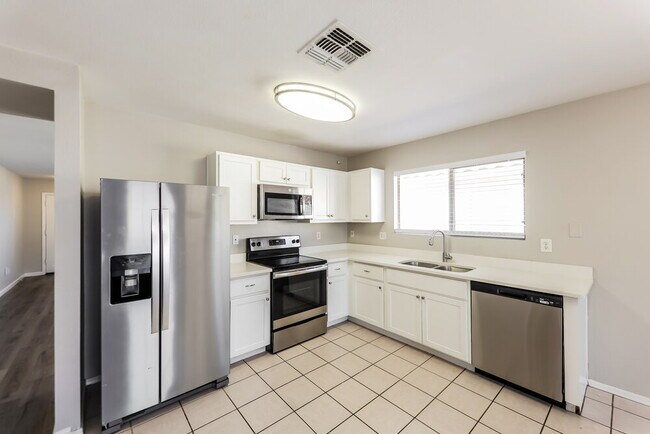 Building Photo - 15830 W Gelding Dr