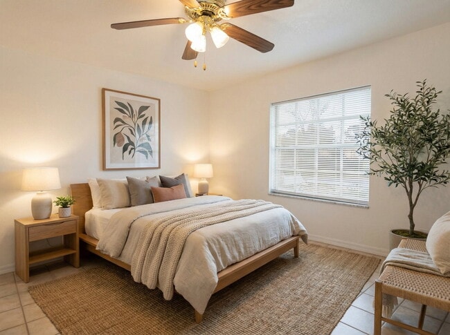 Building Photo - Recently painted 4BR/3BA home with tile floors throughout, fenced yard, detached garage, and prim...