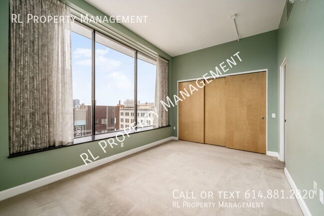 Building Photo - Beautiful 2 bedroom 1.5 bathroom condo in ...