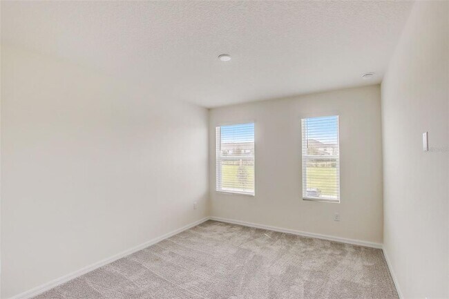 Building Photo - 1688 Tropical Palms Cir