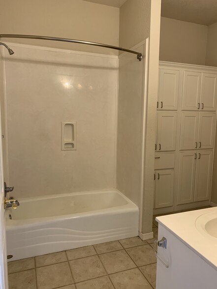 En suite bathroom with plenty of storage - 57 Valleyview Rd