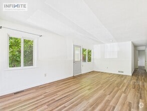 Building Photo - Cute As A Button 3 Bedroom