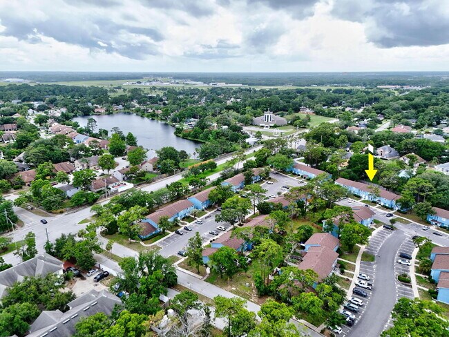 Building Photo - "Charming 2-Bedroom Townhouse Retreat with...