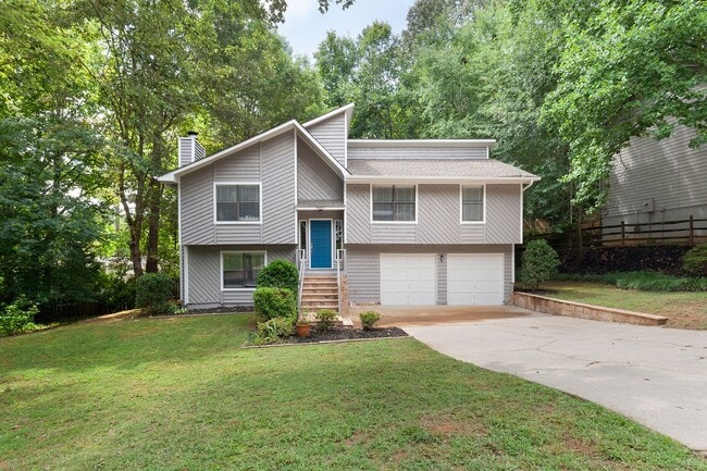Building Photo - Spacious 3/2.5 Split Level w/ Large Bonus Room and Private Backyard!