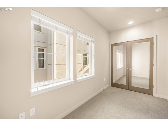 Building Photo - Main Street Living with Granite Kitchen, Gas Fireplace, and MAX Line Access