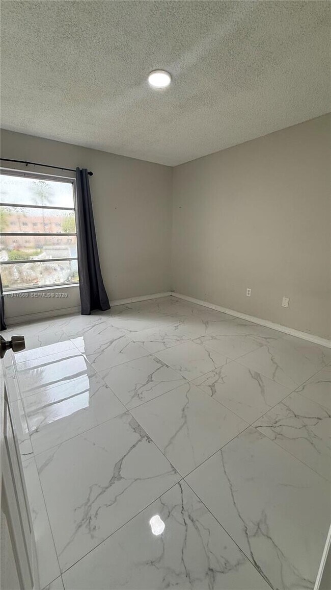 Building Photo - 17600 NW 68th Ave