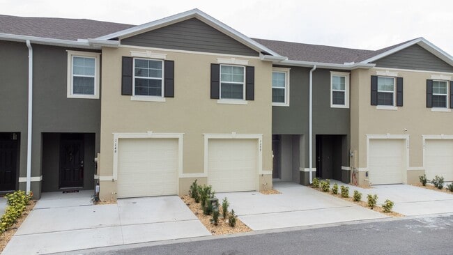 Building Photo - Nice 3/2.5 Townhouse with 1-Car Garage in Atria at Ridgewood Lakes FOR RENT !!!!