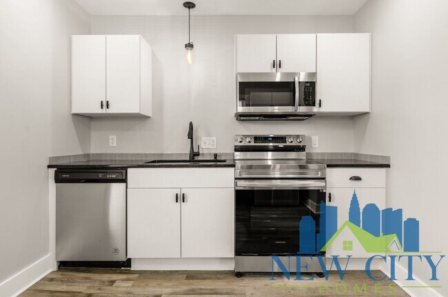 Building Photo - WAIVED $100 ADMIN FEE CALL TODAY!  Newly U...