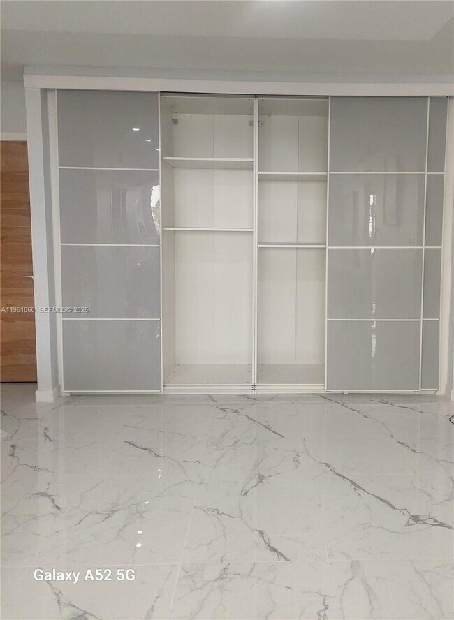 Building Photo - 5005 Collins Ave