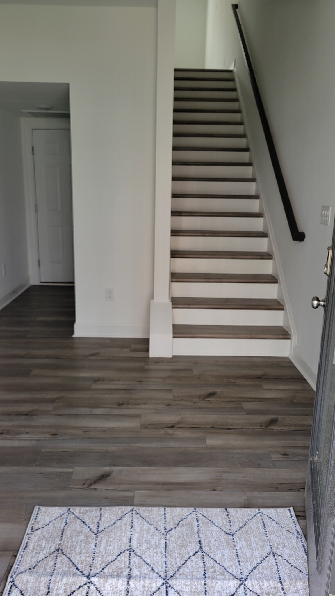 Entrance front exterior leads into flex room area. - 506 Village Branch Ln