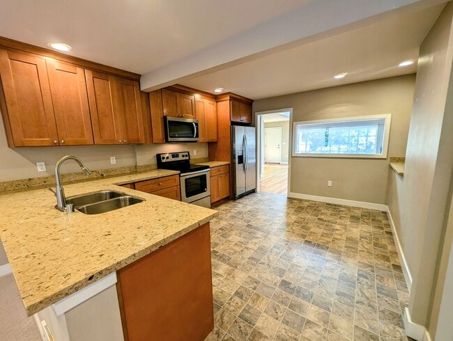 Building Photo - Lake City 3 bedroom Rambler Townhome with ...