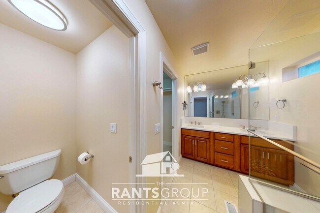 Building Photo - Meticulously Updated Townhome in Gated Community – Low Maintenance & Move-In Ready!