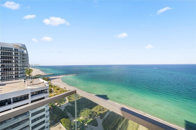 Building Photo - 10203 Collins Ave