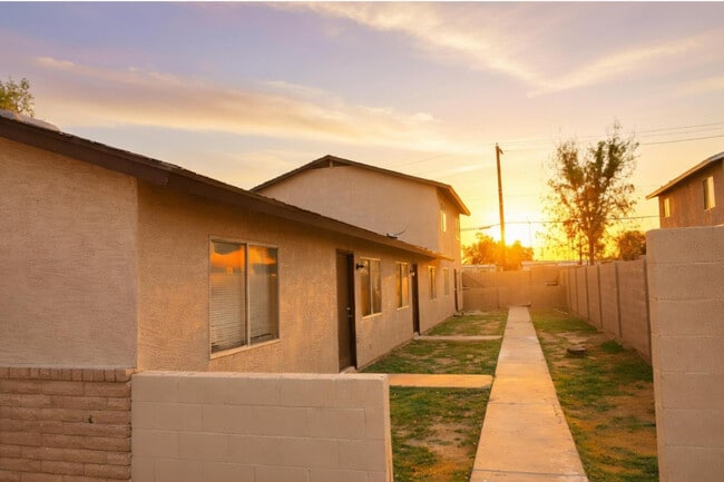 Building Photo - 6440 E Alder Ave