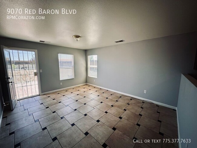 Building Photo - 9070 Red Baron Blvd