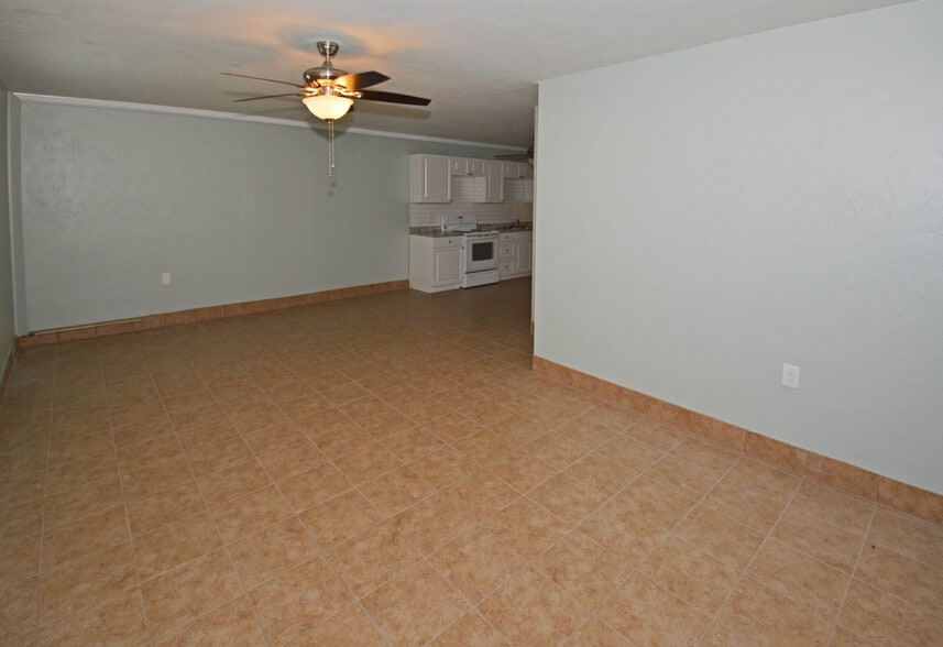 Living room looking into kitchen - 5009 TANGERINE AVE S