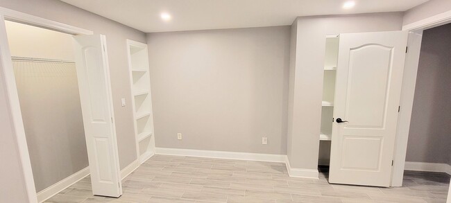 Building Photo - Stylish Basement Rental with Private Ameni...