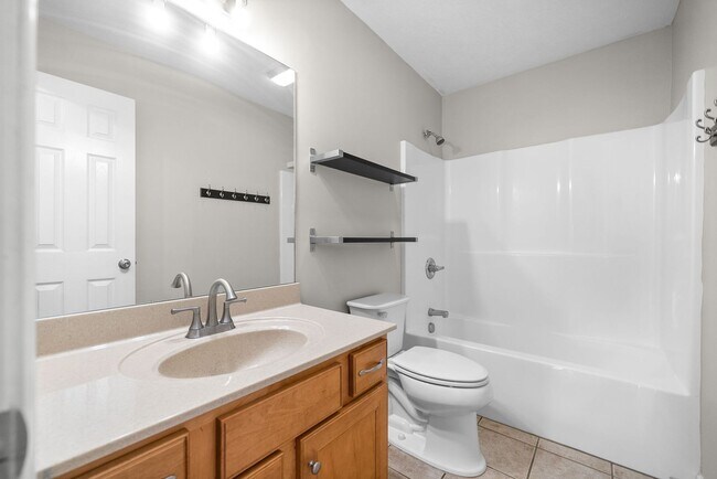 Building Photo - Pet Friendly Three Bedroom with Bonus!