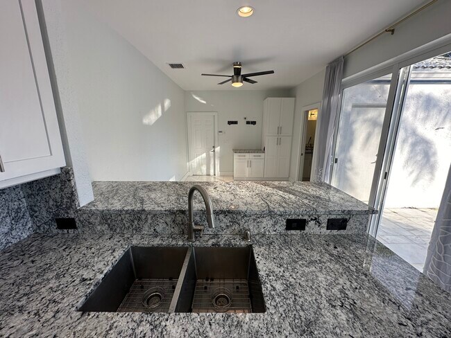 View of kitchenette from kitchen sink - 3656 Mykonos Ct