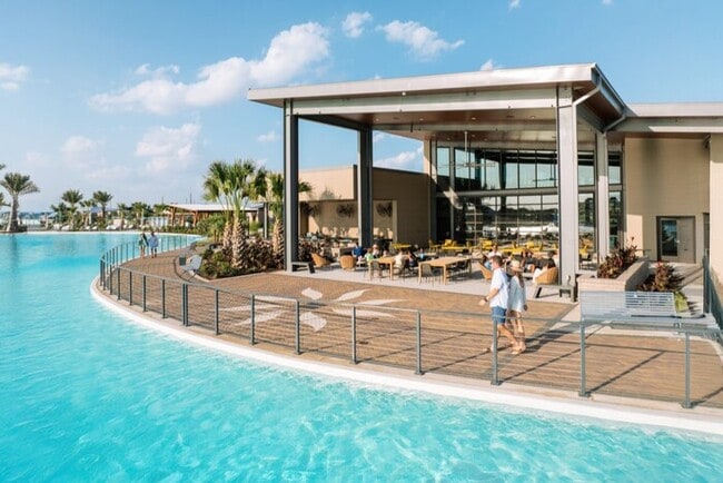 Building Photo - Live the Sunterra Lifestyle: Lagoon, Pool & More